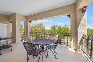 black chairs and table on resort balcony