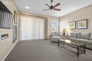 Hotel living area with sofa and tv