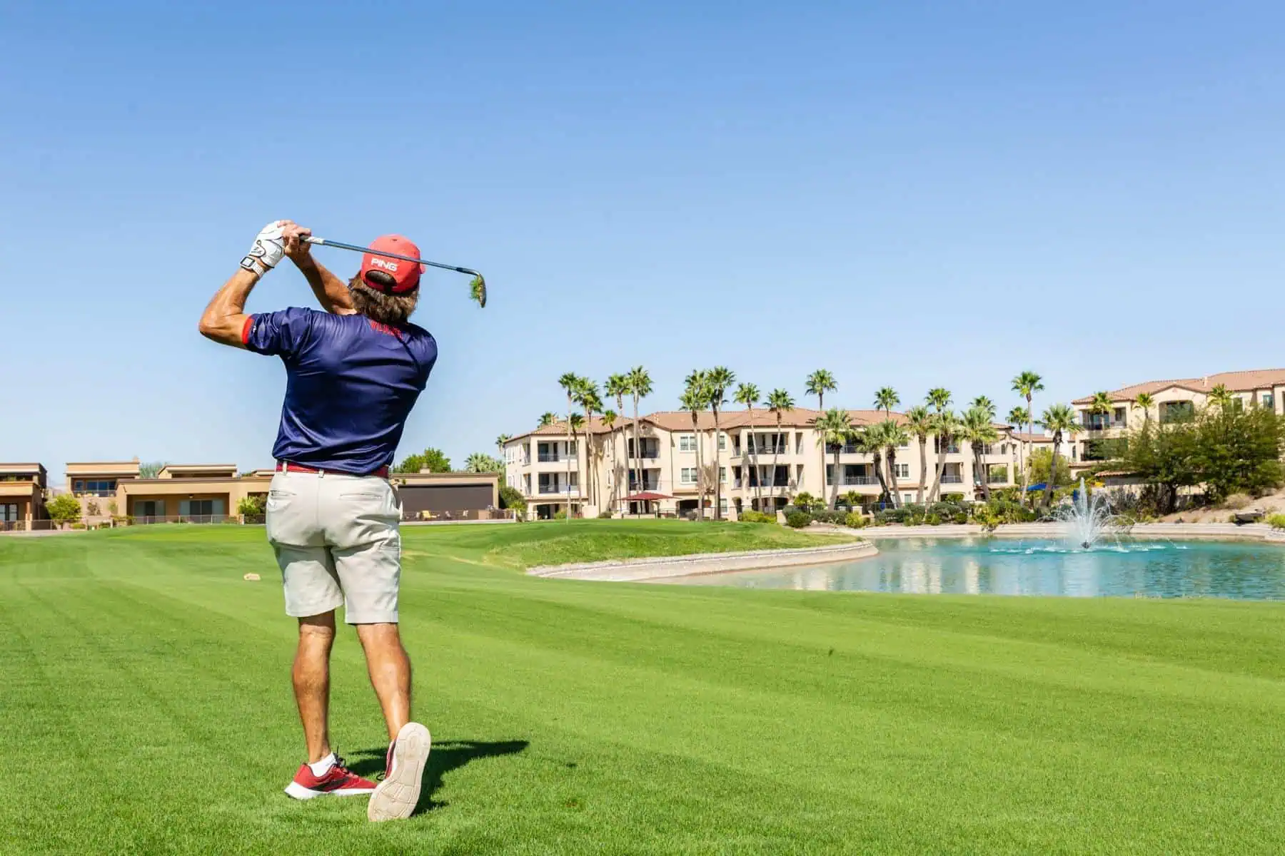 Man playing golf at Canoa Ranch Golf Resort during a Green Valley AZ golf resort vacation.