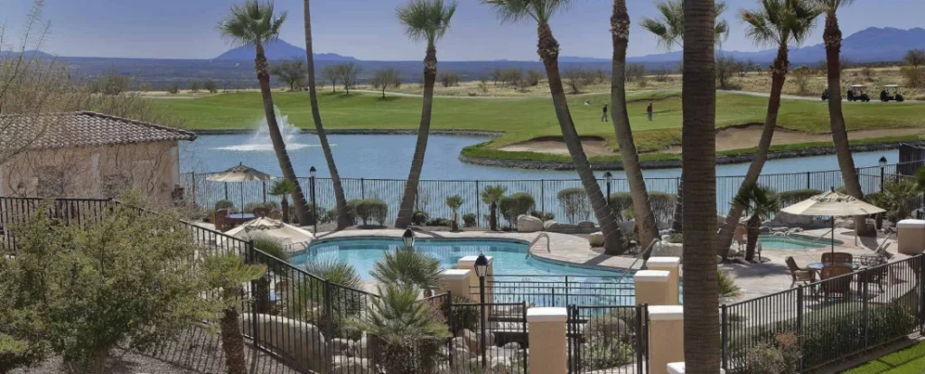 Experience the ultimate spring golf vacation in Arizona at Canoa Ranch Golf Resort, featuring a stunning pool and championship golf course surrounded by breathtaking desert landscapes.