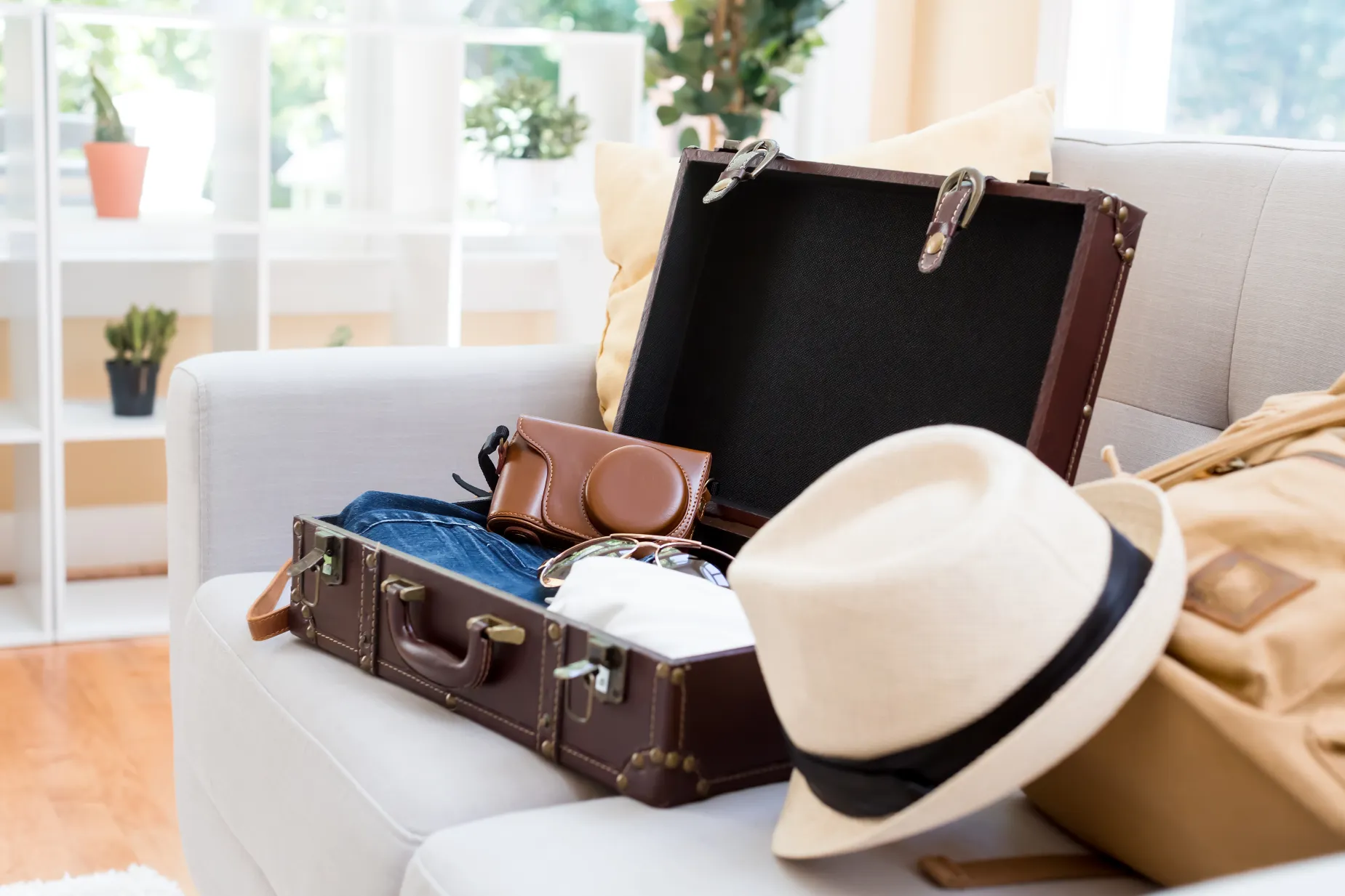 Suitcase and backpack packed for a Green Valley AZ golf resort vacation.