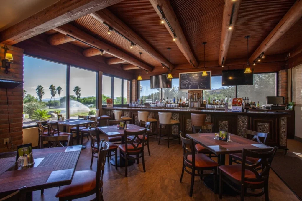 Grill on the Green Arizona bar area with full liquor selection and golf course views at Canoa Ranch