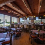 Grill on the Green Arizona bar area with full liquor selection and golf course views at Canoa Ranch