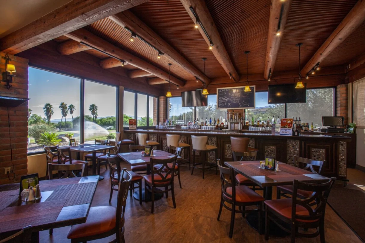 Grill on the Green Arizona bar area with full liquor selection and golf course views at Canoa Ranch