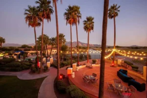 Outdoor space with sofa, chairs and tables
