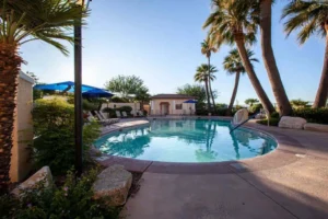Swimming pool with sun lounger in Canoa Ranch Golf Resort